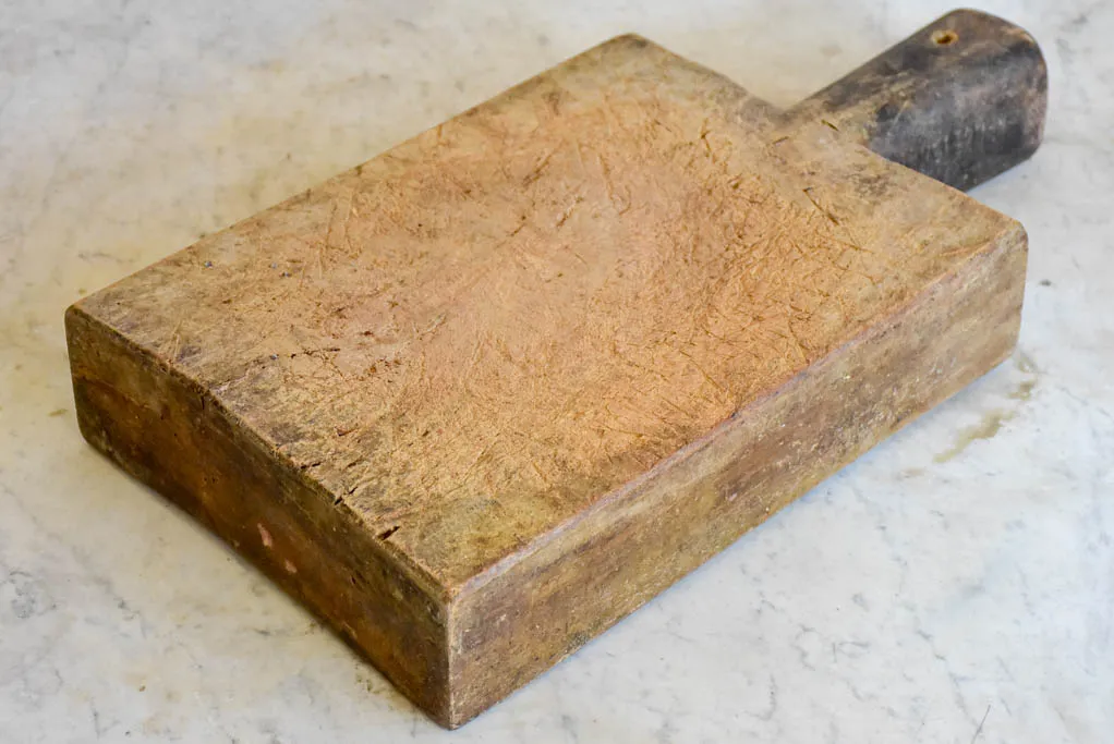 Very chunky antique French cutting board with rectangular handle 8¾" x 16¼"